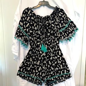 Very cute black and white romper.